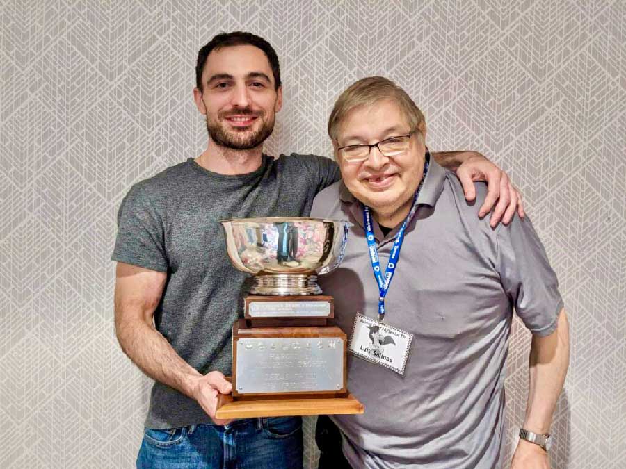 IM Zurab Javakhadze is awarded State Champion Trophy by Organizer Luis Salinas. Photo by Louis Reed.