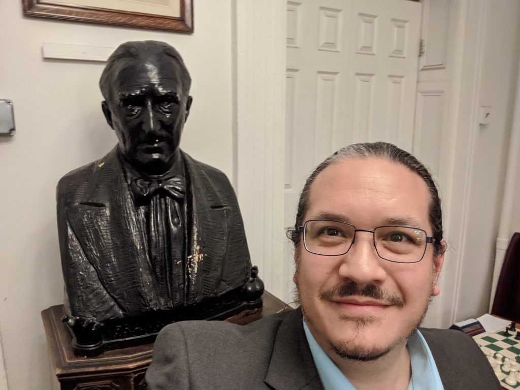 Bust of Frank James Marshall, two time United States Chess Champion (1909-1936) , and Texas Knights Editor, Louis Reed, at the Marshall Chess Club in Manhattan